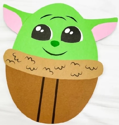 Baby Yoda made of construction paper.