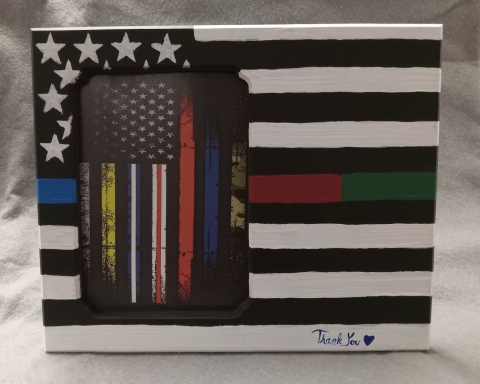 American flag painted in black and white with a line painted blue, red and green. American flag with white, yellow, red & white, blue & white, red, blue and cammoflauge stripes.