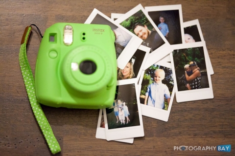 instax mini polaroid camera and pictures