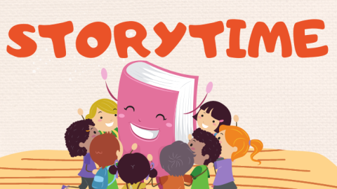 colorful cartoon image of a book surrounded by smiling children