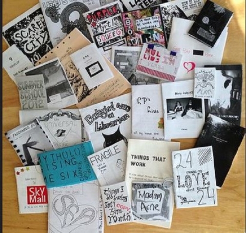 a colorful pile of many handmade zines