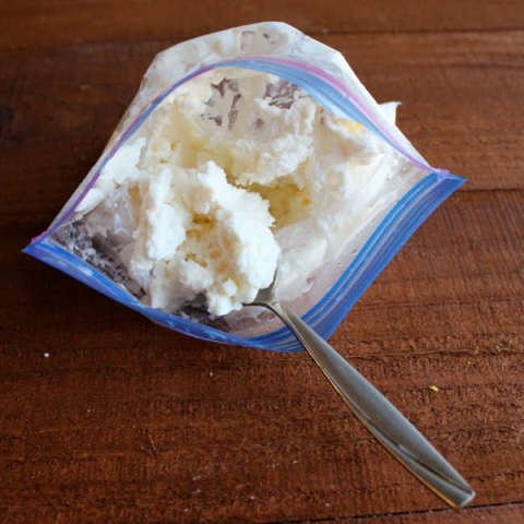 white ice cream in a plastic bag