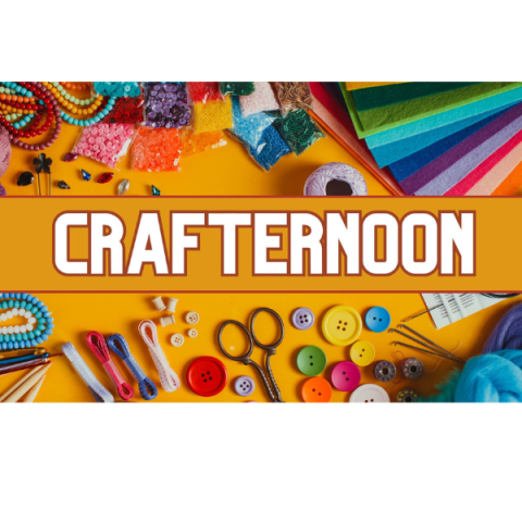 Crafternoon pictured with assorted paint brushes, scissors, paper