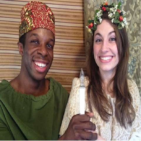 Two people dressed up for different winter holidays.