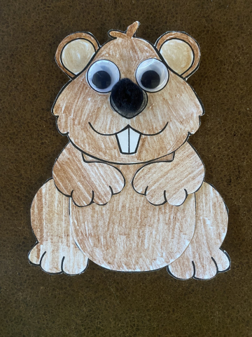 paper ground hog with googly eyes and pompom nose