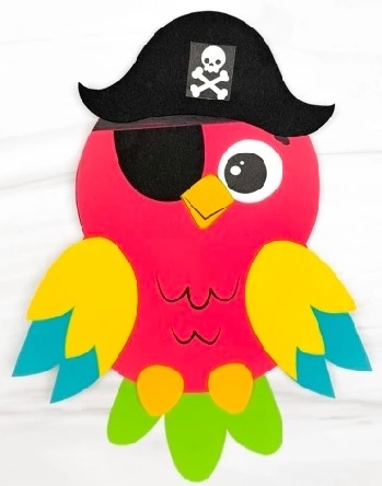 Colored paper parrot wearing a pirate hat and an eye patch.