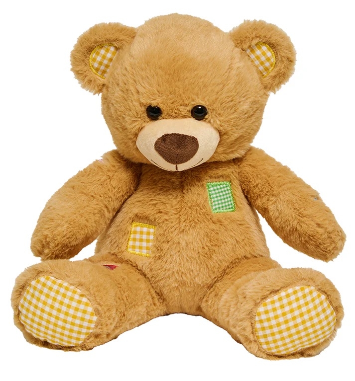 Stuffed bear with patches.